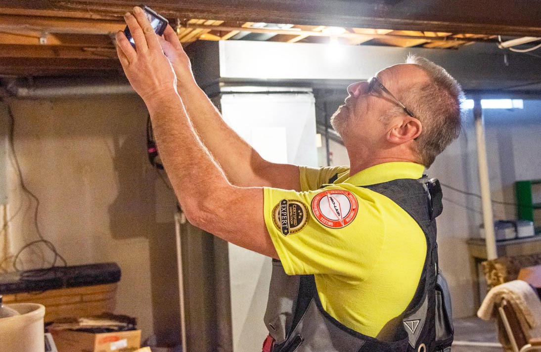 Home Inspector checking the basement